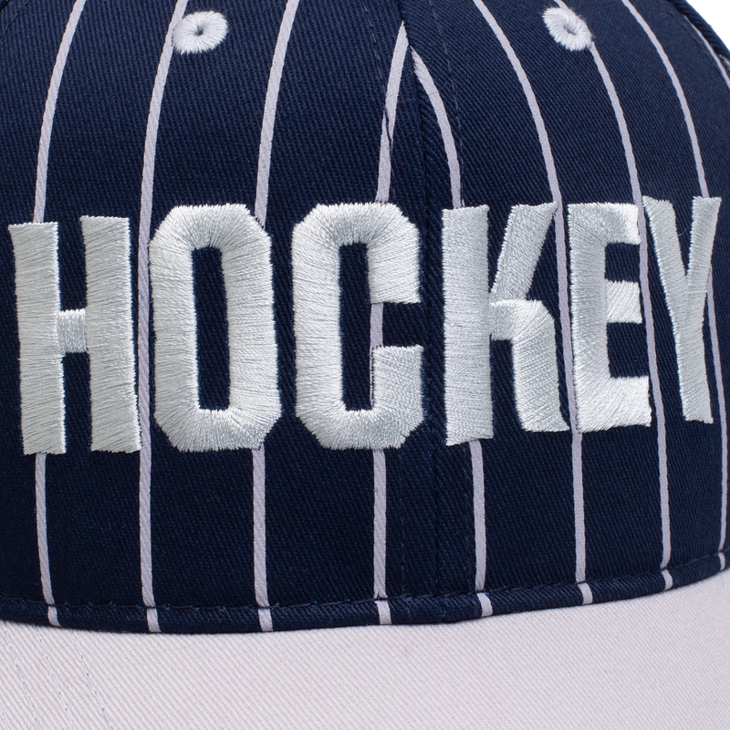 Hockey Snapback Hat Pinstriped Navy logo detail