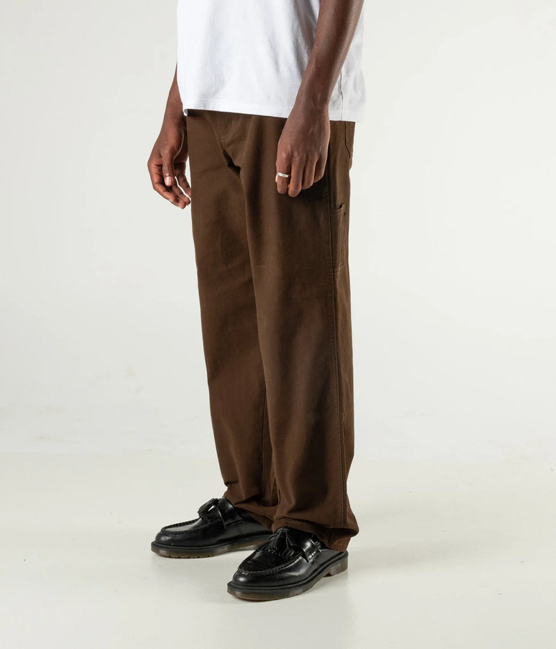 Former Pant Distend VT Brown side view on model
