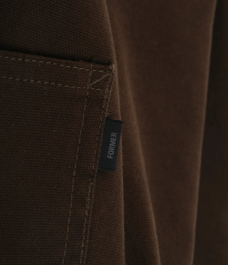 Former Pant Distend VT Brown pocket woven tag