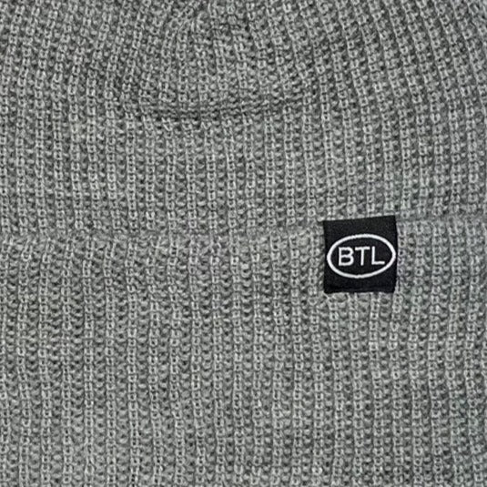 Blue Tile Lounge Beanie Country Code Light Heather woven tag